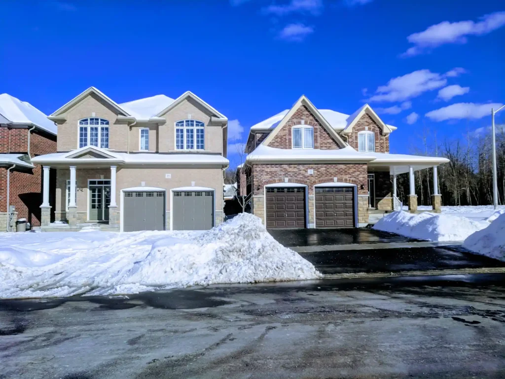 Comparison of subdivision homes between snow removal and no snow removal